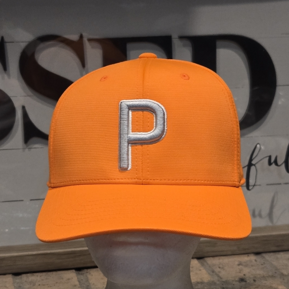 Puma P 110 Snapback Golf Hat in the color Vibrant Orange #022537-09